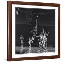 University of Kansas Basketball Player Wilt Chamberlain (C) Playing in a School Game, 1957-George Silk-Framed Photographic Print