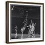 University of Kansas Basketball Player Wilt Chamberlain (C) Playing in a School Game, 1957-George Silk-Framed Premium Photographic Print