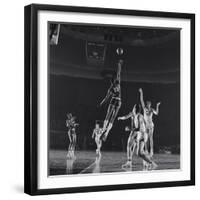 University of Kansas Basketball Player Wilt Chamberlain (C) Playing in a School Game, 1957-George Silk-Framed Photographic Print