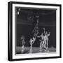 University of Kansas Basketball Player Wilt Chamberlain (C) Playing in a School Game, 1957-George Silk-Framed Photographic Print