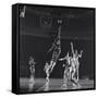 University of Kansas Basketball Player Wilt Chamberlain (C) Playing in a School Game, 1957-George Silk-Framed Stretched Canvas