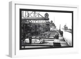 Unloading Ore, Ohio-William Henry Jackson-Framed Art Print