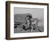 Unloading the goods of a family being moved into the camp for refugees at Forrest City, Arkansas-Walker Evans-Framed Photographic Print