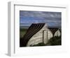 Upturned Boats Used as Sheds, Lindisfarne (Holy Island), Northumbria, England-Jean Brooks-Framed Photographic Print