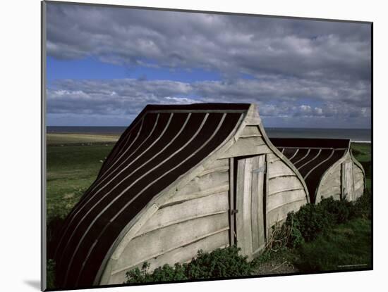 Upturned Boats Used as Sheds, Lindisfarne (Holy Island), Northumbria, England-Jean Brooks-Mounted Photographic Print