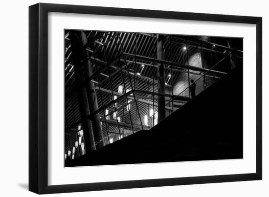 Urban Scene with Modern Building and Silhouetted Figure on Balcony-Sharon Wish-Framed Photographic Print