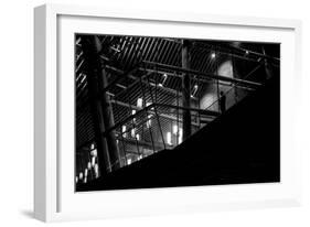 Urban Scene with Modern Building and Silhouetted Figure on Balcony-Sharon Wish-Framed Photographic Print