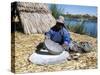 Uros (Urus) Woman Grinding Corn, Islas Flotantas, Reed Islands, Lake Titicaca, Peru, South America-Tony Waltham-Stretched Canvas