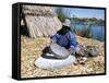 Uros (Urus) Woman Grinding Corn, Islas Flotantas, Reed Islands, Lake Titicaca, Peru, South America-Tony Waltham-Framed Stretched Canvas