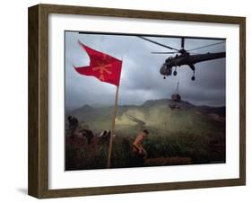 US 1st Air Cavalry Skycrane Helicopter Delivering Ammunition and Supplies to Besieged Marines-Larry Burrows-Framed Photographic Print