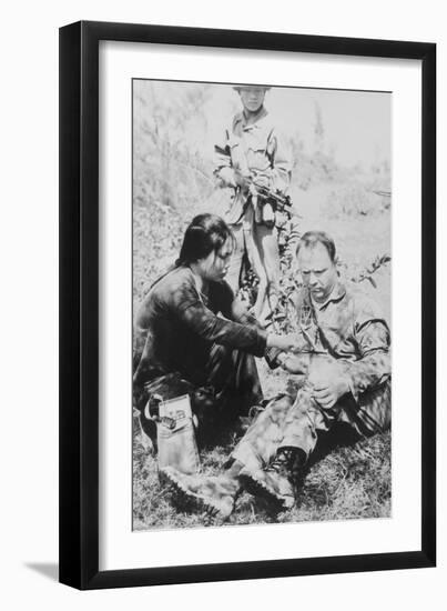 US Air Force Pilot Is Given First Aid by North Vietnam Captors in Jan. 1966-null-Framed Photo