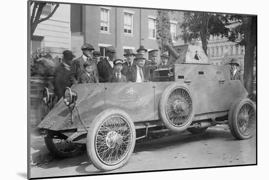 Us Army Armored Truck With Machine Gun Is Gawked By Onlookers on a Washington Street-null-Mounted Art Print