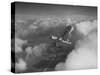 US Army's Ryan, Dragonfly, YO-51 Observation Plane Soaring Above the Clouds-Peter Stackpole-Stretched Canvas