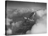 US Army's Ryan, Dragonfly, YO-51 Observation Plane Soaring Above the Clouds-Peter Stackpole-Stretched Canvas