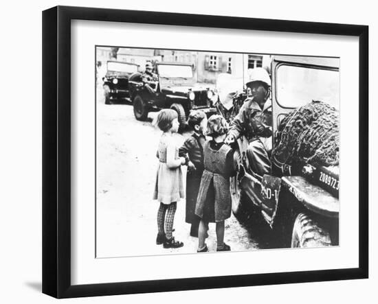 Us Army Soldier Greeting Children with Sweets, Germany, 1945-null-Framed Photographic Print