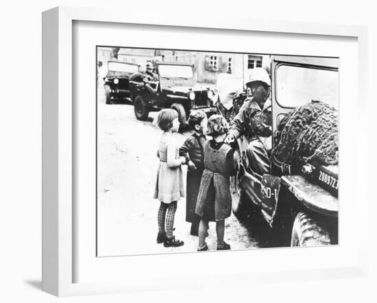 Us Army Soldier Greeting Children with Sweets, Germany, 1945-null-Framed Photographic Print