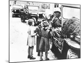 Us Army Soldier Greeting Children with Sweets, Germany, 1945-null-Mounted Photographic Print