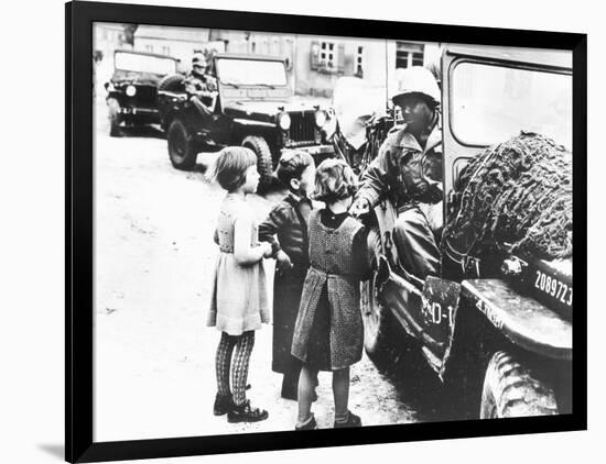 Us Army Soldier Greeting Children with Sweets, Germany, 1945-null-Framed Photographic Print