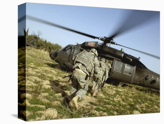 US Army Soldiers Prepare to Board a UH-60 Black Hawk Helicopter-Stocktrek Images-Stretched Canvas