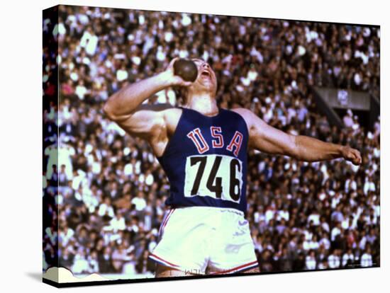 US Athlete in Action During the Shot Put at the Summer Olympics-John Dominis-Stretched Canvas