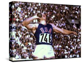 US Athlete in Action During the Shot Put at the Summer Olympics-John Dominis-Stretched Canvas