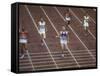 US Athlete Michael Larrabee Winning the 400 Meters at the Summer Olympics-George Silk-Framed Stretched Canvas