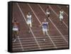 US Athlete Michael Larrabee Winning the 400 Meters at the Summer Olympics-George Silk-Framed Stretched Canvas