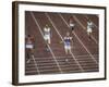 US Athlete Michael Larrabee Winning the 400 Meters at the Summer Olympics-George Silk-Framed Premium Photographic Print