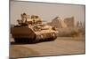 US Bradley Fighting Vehicle Passes by the Palace of Historic Ctesiphon, Feb. 16, 2008-null-Mounted Photo