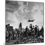 US C-47 Cargo Plane Flying over Ruins, Approaching Tempelhof Airport with Food and Supplies-Walter Sanders-Mounted Photographic Print