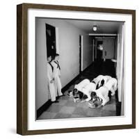 US Coast Guard Academy, Lower Classmen Bowing over Books, Hoping for Luck in Examinations-William C^ Shrout-Framed Photographic Print