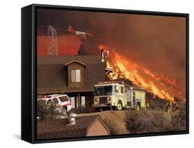 US Forest Service Air Tanker Drops Fire Retardant as the Fire Burns in the Hills Above a Home-null-Framed Stretched Canvas