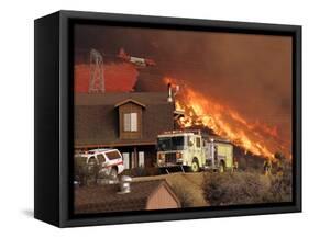 US Forest Service Air Tanker Drops Fire Retardant as the Fire Burns in the Hills Above a Home-null-Framed Stretched Canvas