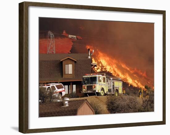 US Forest Service Air Tanker Drops Fire Retardant as the Fire Burns in the Hills Above a Home-null-Framed Photographic Print