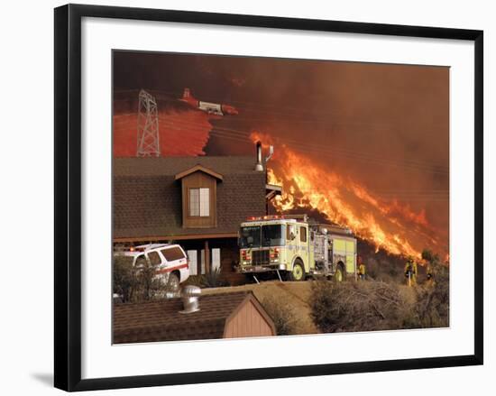 US Forest Service Air Tanker Drops Fire Retardant as the Fire Burns in the Hills Above a Home-null-Framed Photographic Print