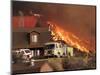 US Forest Service Air Tanker Drops Fire Retardant as the Fire Burns in the Hills Above a Home-null-Mounted Photographic Print