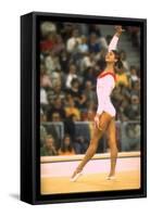 US Gymnast Ludmila Turishcheva Performing a Floor Exercise at the Summer Olympics-John Dominis-Framed Stretched Canvas