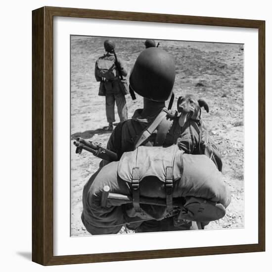 US Marine Jesse Goin Carrying His Dog Towards the Front During the Fighting on Kwajalein-George Strock-Framed Photographic Print