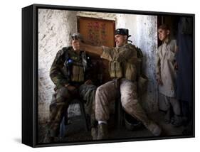 US Marine LCpl Mathew Gorzkiewicz Tries Out an Afghan Boy's Sling During a Patrol in Afghanistan-null-Framed Stretched Canvas