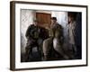 US Marine LCpl Mathew Gorzkiewicz Tries Out an Afghan Boy's Sling During a Patrol in Afghanistan-null-Framed Photographic Print