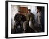 US Marine LCpl Mathew Gorzkiewicz Tries Out an Afghan Boy's Sling During a Patrol in Afghanistan-null-Framed Photographic Print