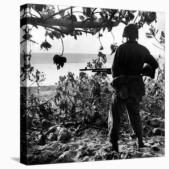 US Marine Looking at Bodies of Dead Japanese Soldiers Killed During Battle For Control of Saipan-W^ Eugene Smith-Stretched Canvas