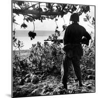 US Marine Looking at Bodies of Dead Japanese Soldiers Killed During Battle For Control of Saipan-W^ Eugene Smith-Mounted Photographic Print