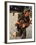 US Marine Medic Running Along Beach with Injured Vietnamese Infant under Fire During Vietnam War-Paul Schutzer-Framed Photographic Print