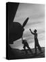 US Marines Pushing Through the Props of Bomber at US Naval Base on Midway Island-Frank Scherschel-Stretched Canvas