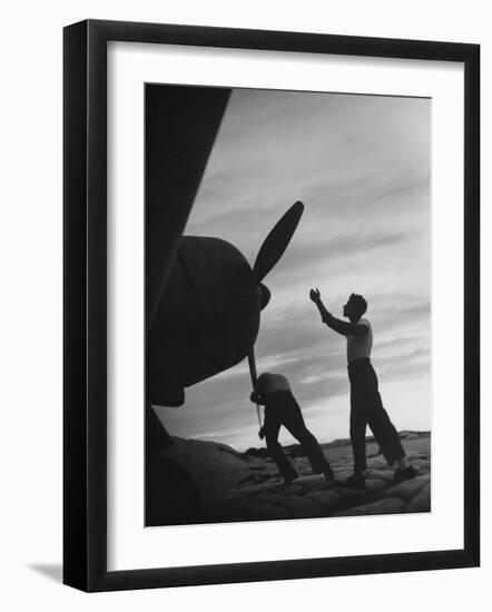 US Marines Pushing Through the Props of Bomber at US Naval Base on Midway Island-Frank Scherschel-Framed Premium Photographic Print