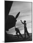 US Marines Pushing Through the Props of Bomber at US Naval Base on Midway Island-Frank Scherschel-Mounted Premium Photographic Print