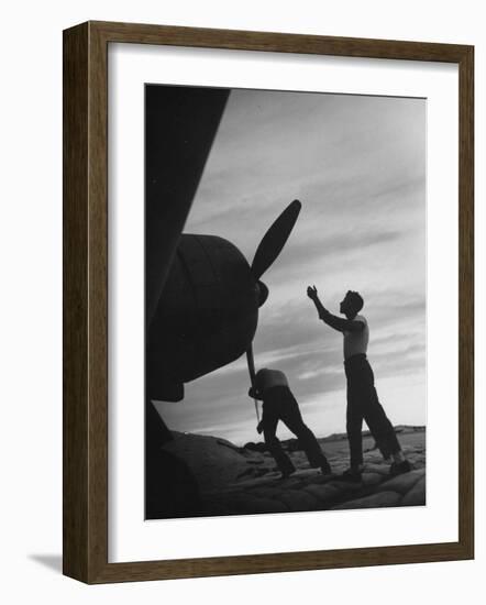 US Marines Pushing Through the Props of Bomber at US Naval Base on Midway Island-Frank Scherschel-Framed Photographic Print