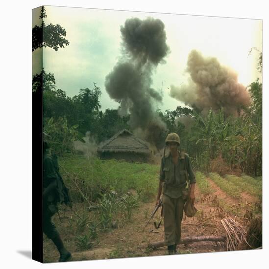 US Marines Walk Away from Blown Up Viet Cong Base, May 1966-null-Stretched Canvas