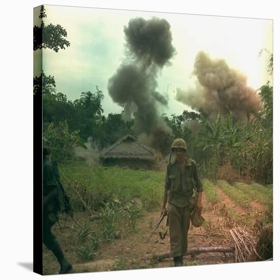 US Marines Walk Away from Blown Up Viet Cong Base, May 1966-null-Stretched Canvas